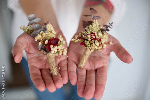 Rustic wedding boutonnieres with natural floral elements