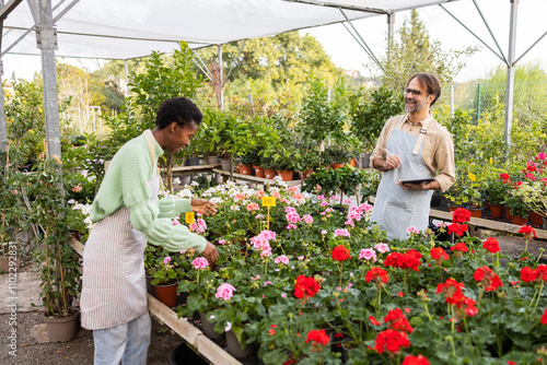 Employees interaction in a vibrant garden store