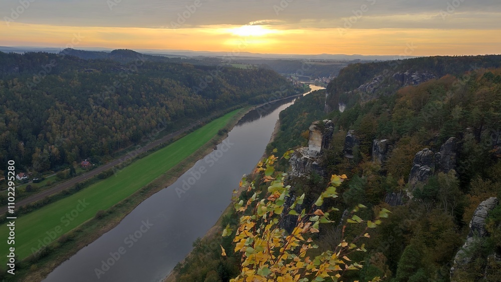 Obraz premium sunset over the river