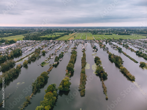 Aerial View of Houses on Loosdrechtse Plassen Lake with Islands and Canals. Scheendijk, Netherlands photo