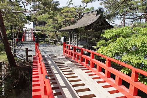 wood bridge and altar in a buddhist temple (godaido) in matsushima in japan  photo