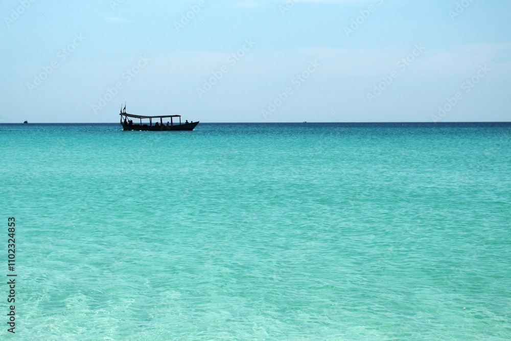 boat on turquoise sea boat on turquoise sea