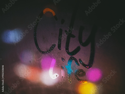The inscription neon on the fogged glass. Neon lighting.