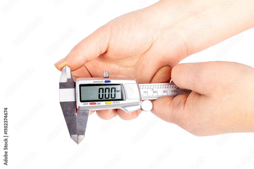 caliper. a device for measuring precision. the size of a part, as well as the diameter. close-up. it is in a person's hand. caliper. a device for measuring precision. the size of a part, as well as the diameter. close-up. it is in a person's hand.