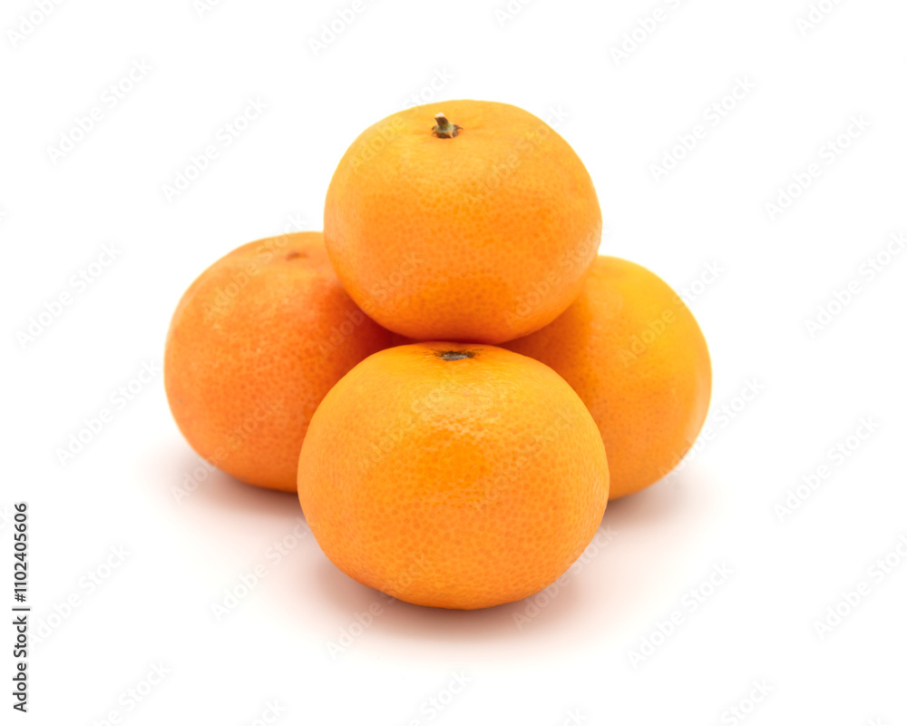 Stack of four fresh tangerines on white background Stack of four fresh tangerines on white background