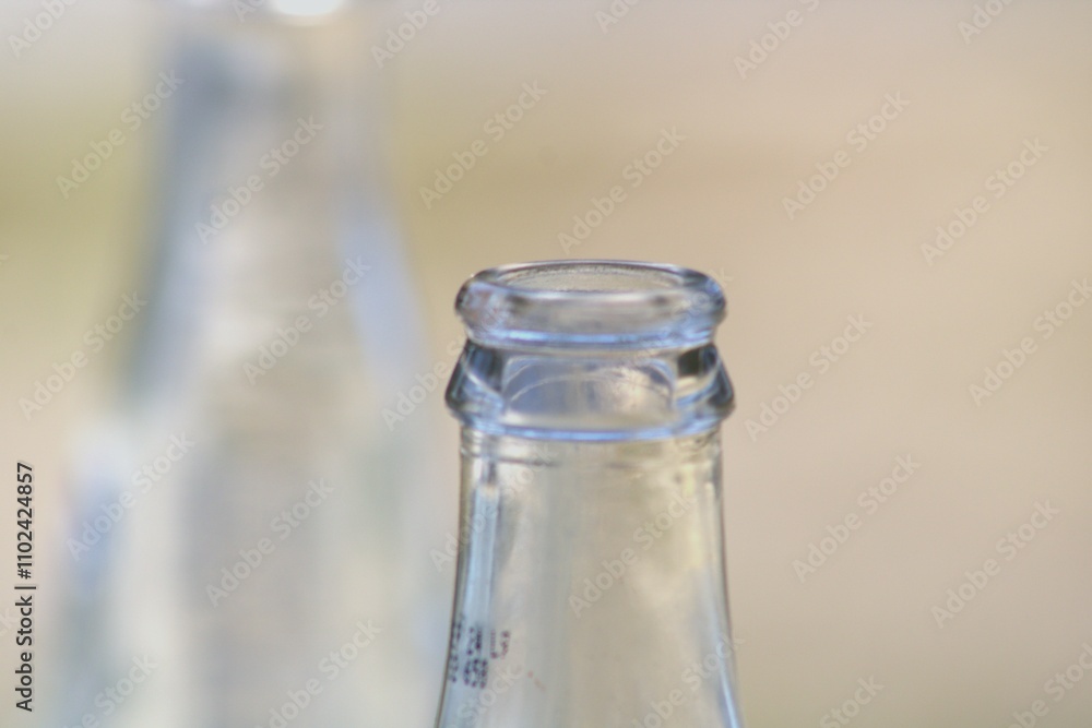 top opening of glass bottle up close top opening of glass bottle up close