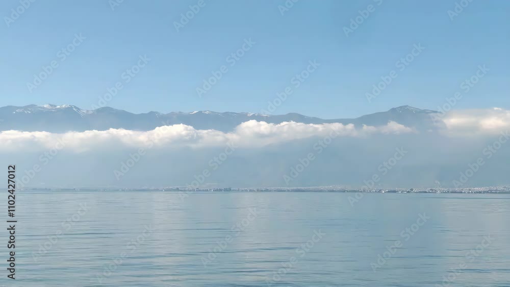 4K aerial video of the breathtaking clouds surrounding Cangshan Mountain in Dali, China 4K aerial video of the breathtaking clouds surrounding Cangshan Mountain in Dali, China