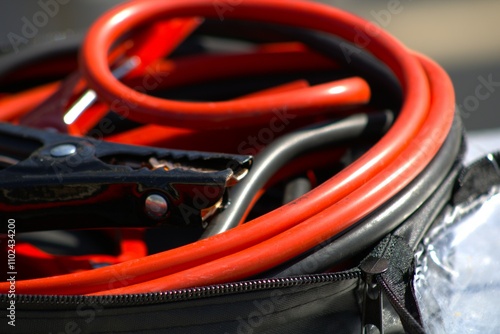 red and black jumpstart car cables