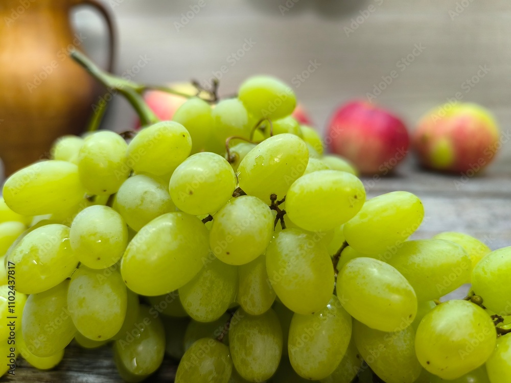 Green ripe juicy grapes on the table. Green ripe juicy grapes on the table.