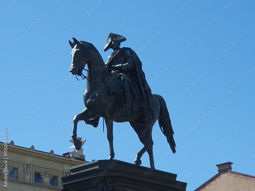 Obraz premium Close up of the historic bronze equestrian statue of Prussian emperor Friedrich der Große (Frederick the Great) riding on his horse on Unter den Linden street Berlin, Germany