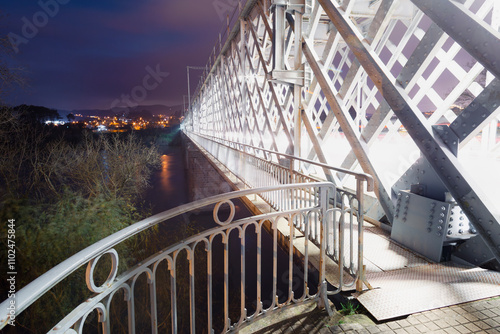 The Tuy International Bridge is a bridge, located between the towns of Tuy, in the province of Pontevedra, Spain, and Valença do Minho in Portugal, joining the two banks of the Miño River. photo