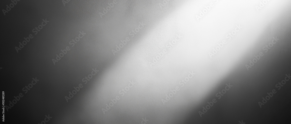 Dramatic black and white spotlight effect with soft gradients creating cinematic and moody atmosphere for photography or graphic design Dramatic black and white spotlight effect with soft gradients creating cinematic and moody atmosphere for photography or graphic design