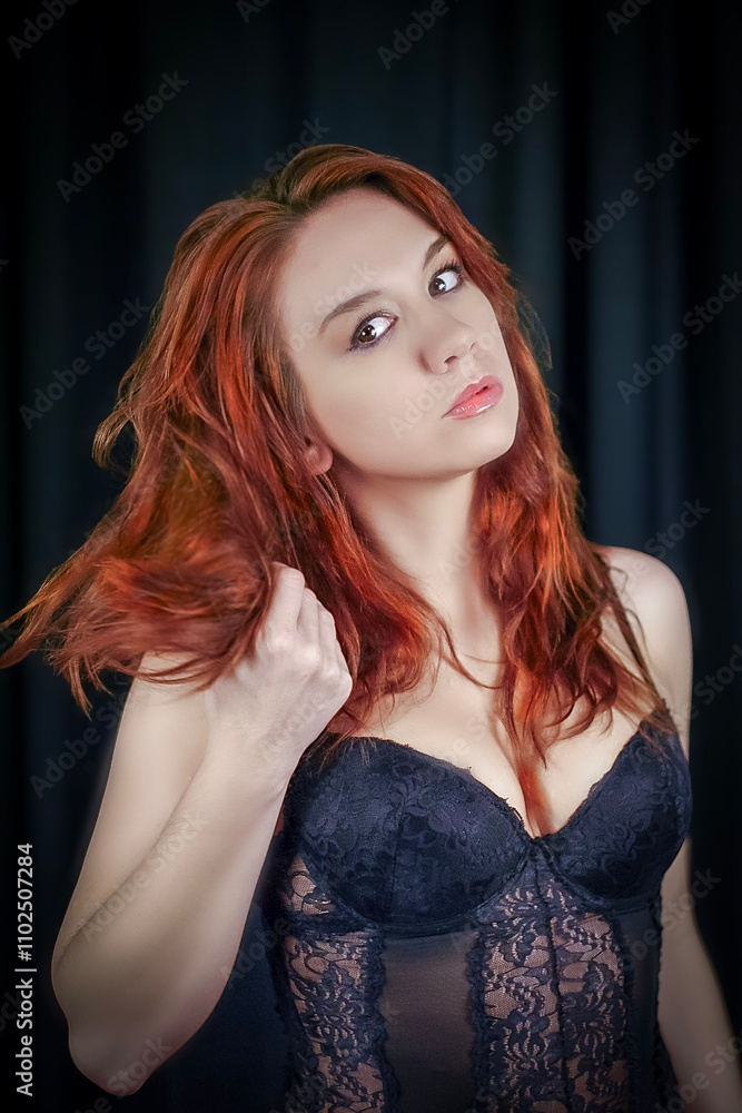 portrait of a beautiful, red-headed woman in a black night gown portrait of a beautiful, red-headed woman in a black night gown