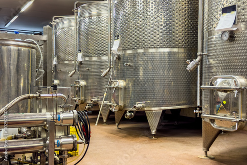 Slika na platnu Stainless steel drum barrel for wine production