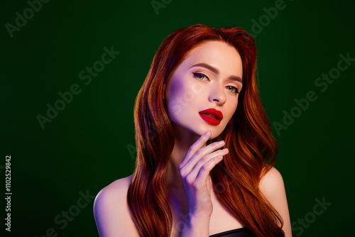 Photo of gorgeous chic lady touch chin feel tempting passionate with red pomade on green color background