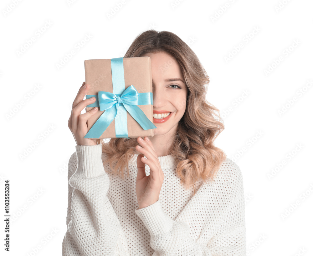 Beautiful young woman with Christmas present on white background Beautiful young woman with Christmas present on white background