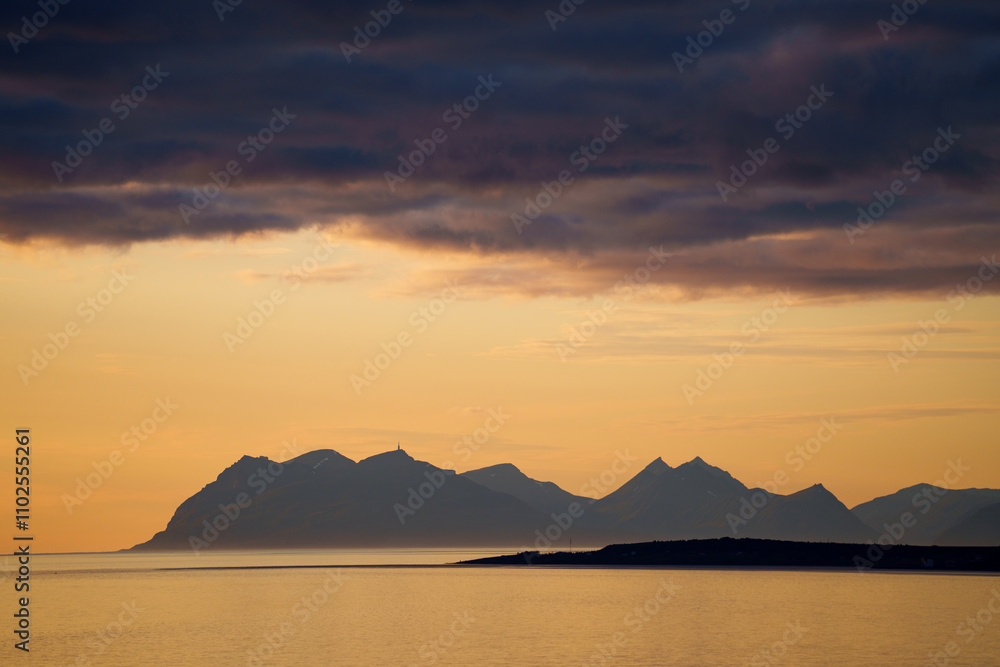 A Beautiful and Serene Sunset Over a Stunning Mountainous Landscape that Inspires Calmness A Beautiful and Serene Sunset Over a Stunning Mountainous Landscape that Inspires Calmness