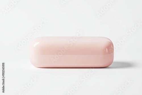 A pink soap bar is sitting on a white background, the perfect form of soap