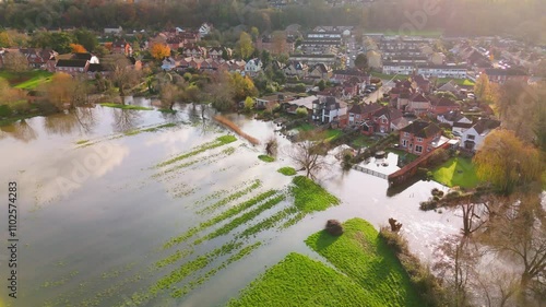 Aerial shot showing flooded fields and gardens of residential properties when the River Avon burst its banks after the heavy rain of Storm Bert.