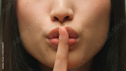 Obraz na plátně Silence gesture extreme close up female mouth Asian chinese korean japanese woma