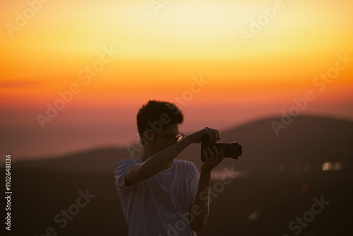 photographer at sunset