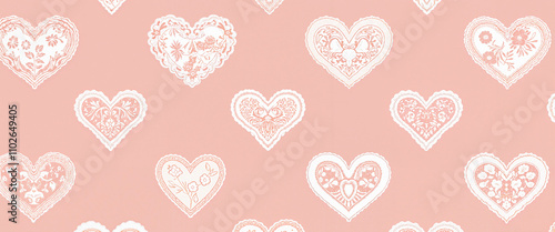 Lace hearts pattern on pink background