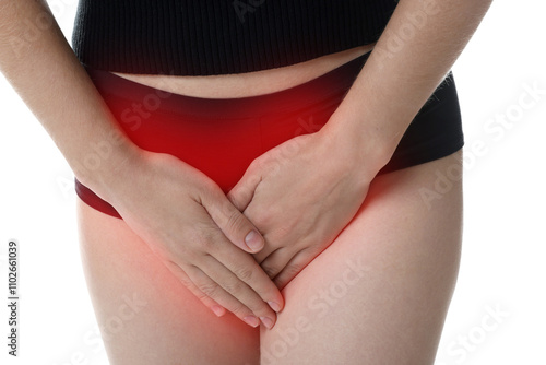 STD (sexually transmitted diseases). Woman holding hands near her groin on white background, closeup