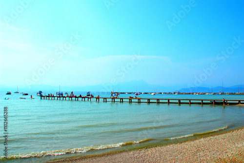 Bilde på lerret Luminous view from Lungolago near Lazise on the eastern shore of Lake Garda, a p