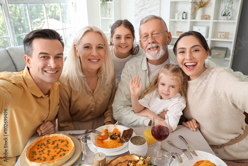 Happy family taking selfie ...
