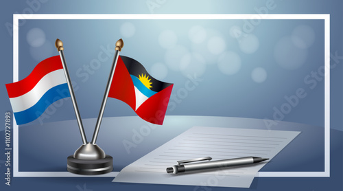 Netherlands and Antigua and Barbuda Small national flag on bokeh background, cooperative relationship