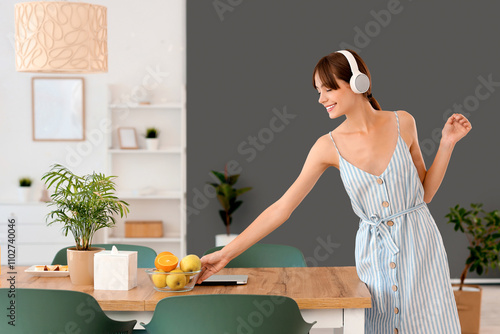 Young woman with headphones...