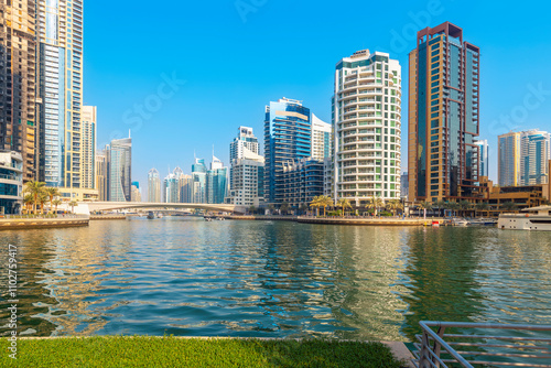 The Dubai Marina, a waterfront promenade of shops, boat marinas and skyscrapers, along the coast of Dubai, United Arab Emirates.	