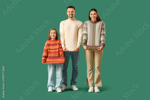 Happy family with their dau...