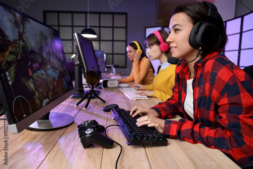 Young woman playing compute...