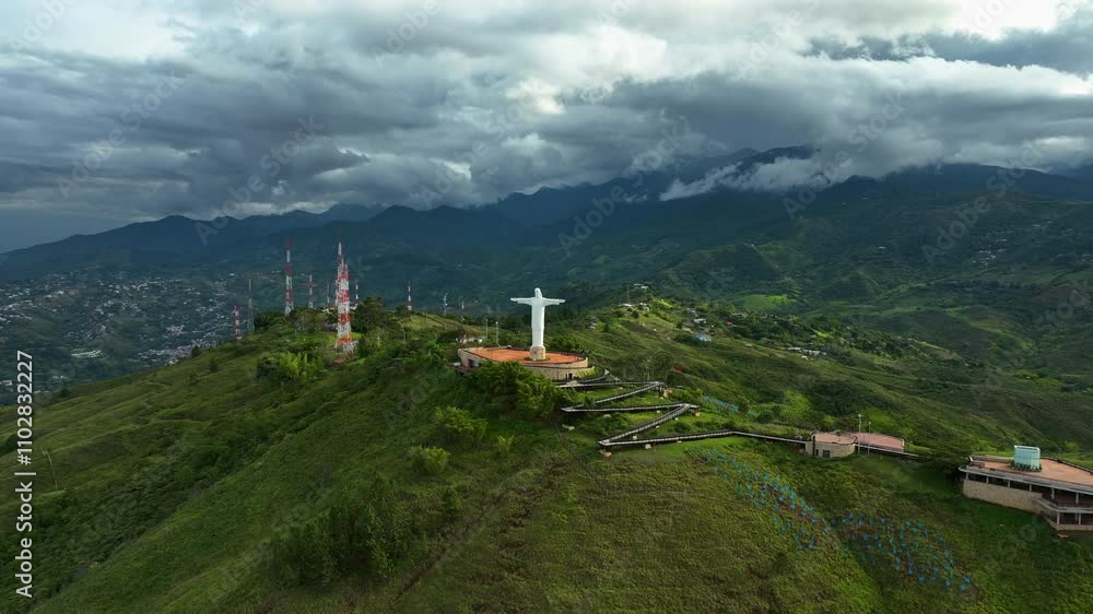 Aerial view orbiting the Monumento a Cristo Rey statue in Cali, Colombia Aerial view orbiting the Monumento a Cristo Rey statue in Cali, Colombia