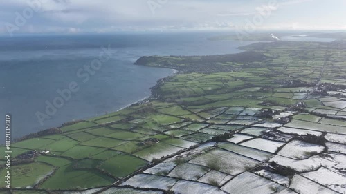 Aerial video of freezing fog on the snowy beautiful and spectacular Rolling hills of the Glens of Antrim Northern Ireland photo