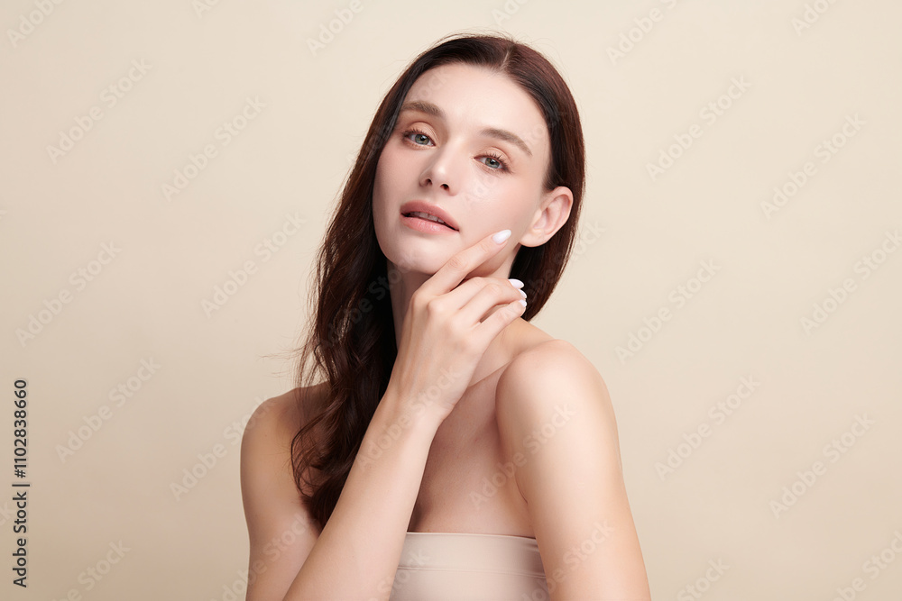 Beautiful young woman with clean fresh skin on beige background, Face care, Facial treatment, Cosmetology, beauty and spa, women portrait. Beautiful young woman with clean fresh skin on beige background, Face care, Facial treatment, Cosmetology, beauty and spa, women portrait.