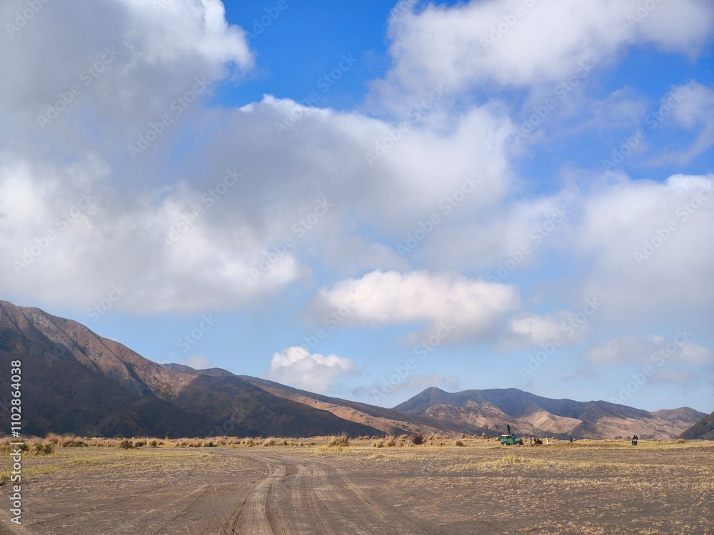 A majestic view of the Bromo Tengger Semeru National Park. The iconic A majestic view of the Bromo Tengger Semeru National Park. The iconic