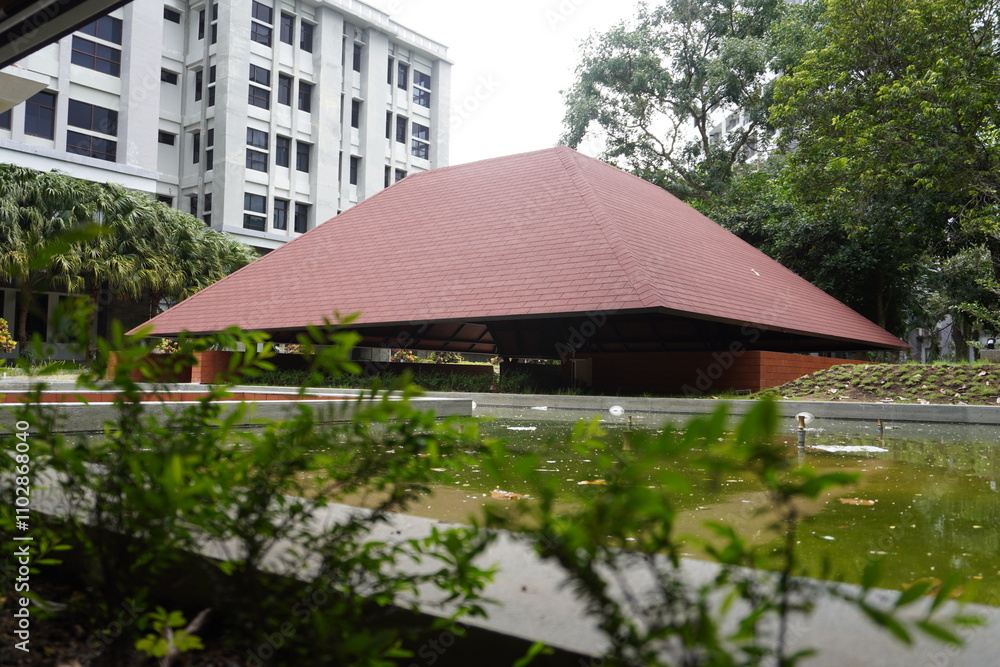 Semi-outdoor building with aesthetic red triangular roof Semi-outdoor building with aesthetic red triangular roof