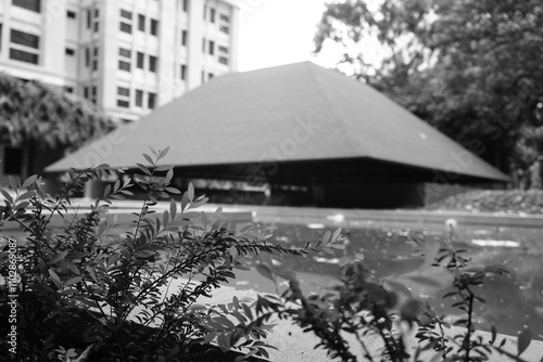 Semi-outdoor building with aesthetic red triangular roof photo