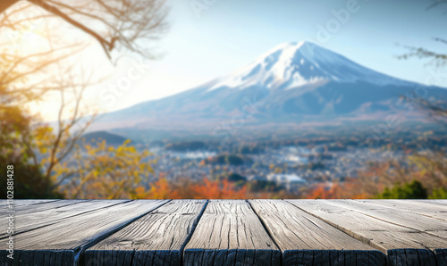 The empty wooden table top with blur background of Mount Fuji. Exuberant image