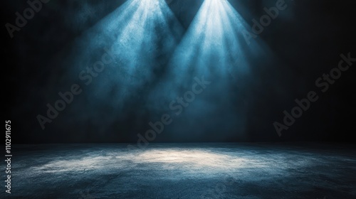 Atmospheric dark room featuring spotlight illumination on a concrete surface.