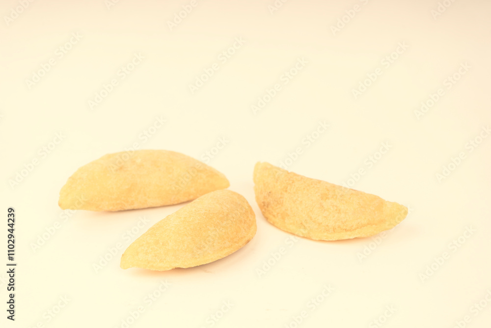Fototapeta premium Colombian empanada with spicy sauce 