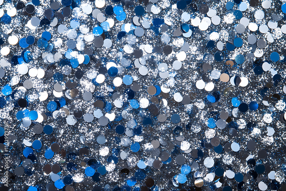 An elegant background with silver and blue sparkles, perfect for sophisticated New Year designs, party themes, and winter celebrations An elegant background with silver and blue sparkles, perfect for sophisticated New Year designs, party themes, and winter celebrations
