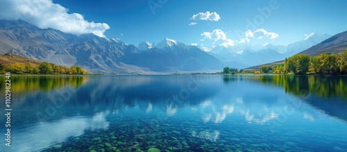 Awar Lake serene landscape with mountains and clear blue waters reflecting the sky in a tranquil natural setting photo