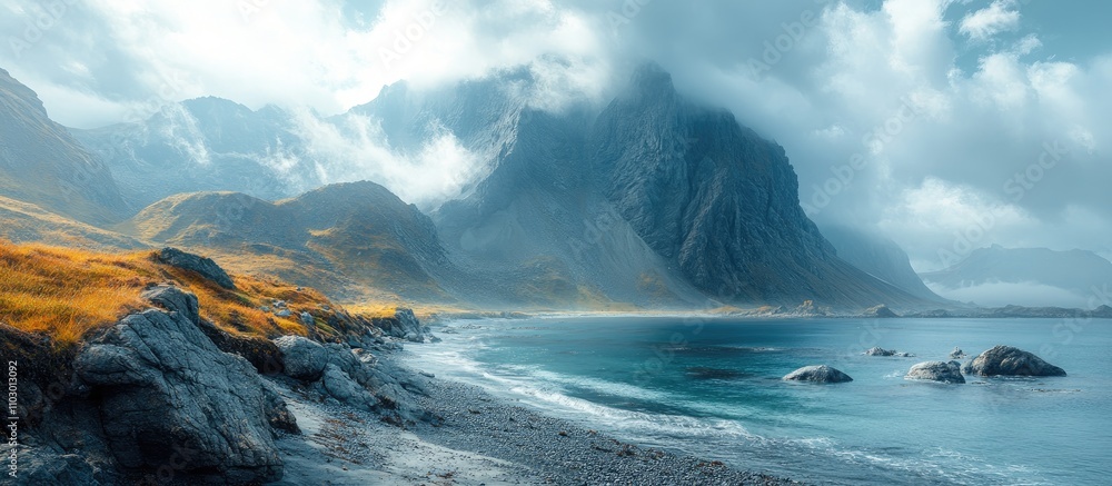 Naklejka premium Majestic rocky beach landscapes with mountains and misty skies creating a serene natural ambience and captivating scenic views.