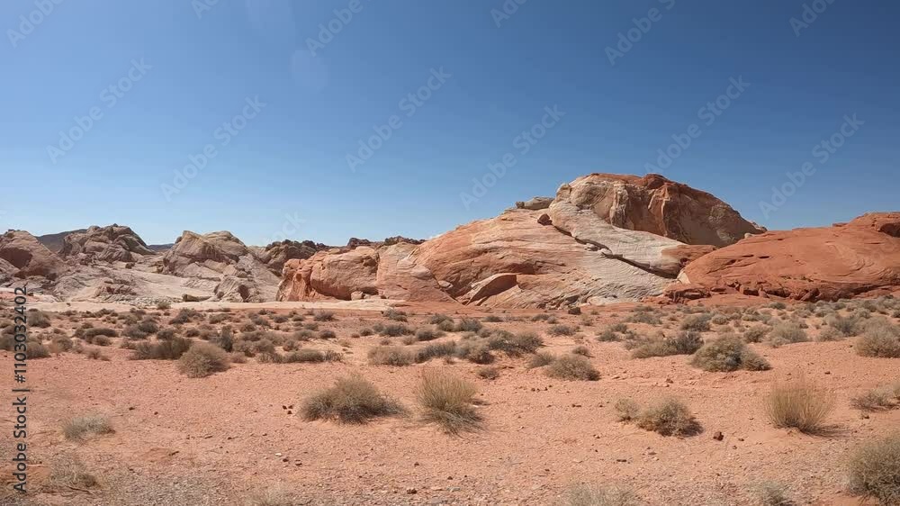 Driving along the scenic road of Valley of Fire near Las Vegas Driving along the scenic road of Valley of Fire near Las Vegas