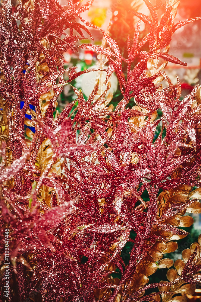 Red and gold glittering Christmas decorations. Close-up, vertical photo. Red and gold glittering Christmas decorations. Close-up, vertical photo.