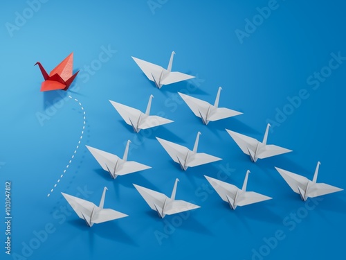 Individuality concept. Individual and unique leader red paper swan flies to the side. 3D illustration.3D rendering on blue background. photo