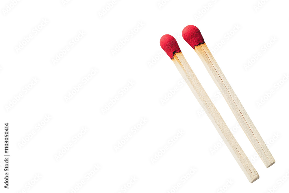 Long wooden matchsticks with red tips on a light background arranged neatly for creative compositions Long wooden matchsticks with red tips on a light background arranged neatly for creative compositions